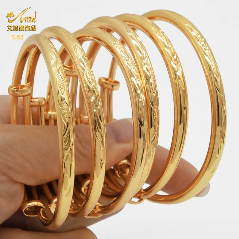 Luxurious African Jewelry: Gold-Toned Copper Bangle Bracelet for Women - Flexi Africa - Flexi Africa offers Free Delivery Worldwide - Vibrant African traditional clothing showcasing bold prints and intricate designs