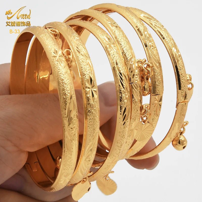 Luxurious African Jewelry: Gold-Toned Copper Bangle Bracelet for Women - Flexi Africa - Flexi Africa offers Free Delivery Worldwide - Vibrant African traditional clothing showcasing bold prints and intricate designs