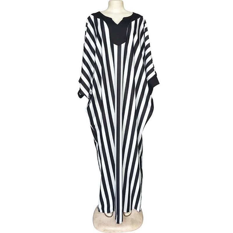 Chic Monochrome: African Long Bat Sleeve Dress with Fashionable Black and White Stripes - Flexi Africa - Flexi Africa offers Free Delivery Worldwide - Vibrant African traditional clothing showcasing bold prints and intricate designs