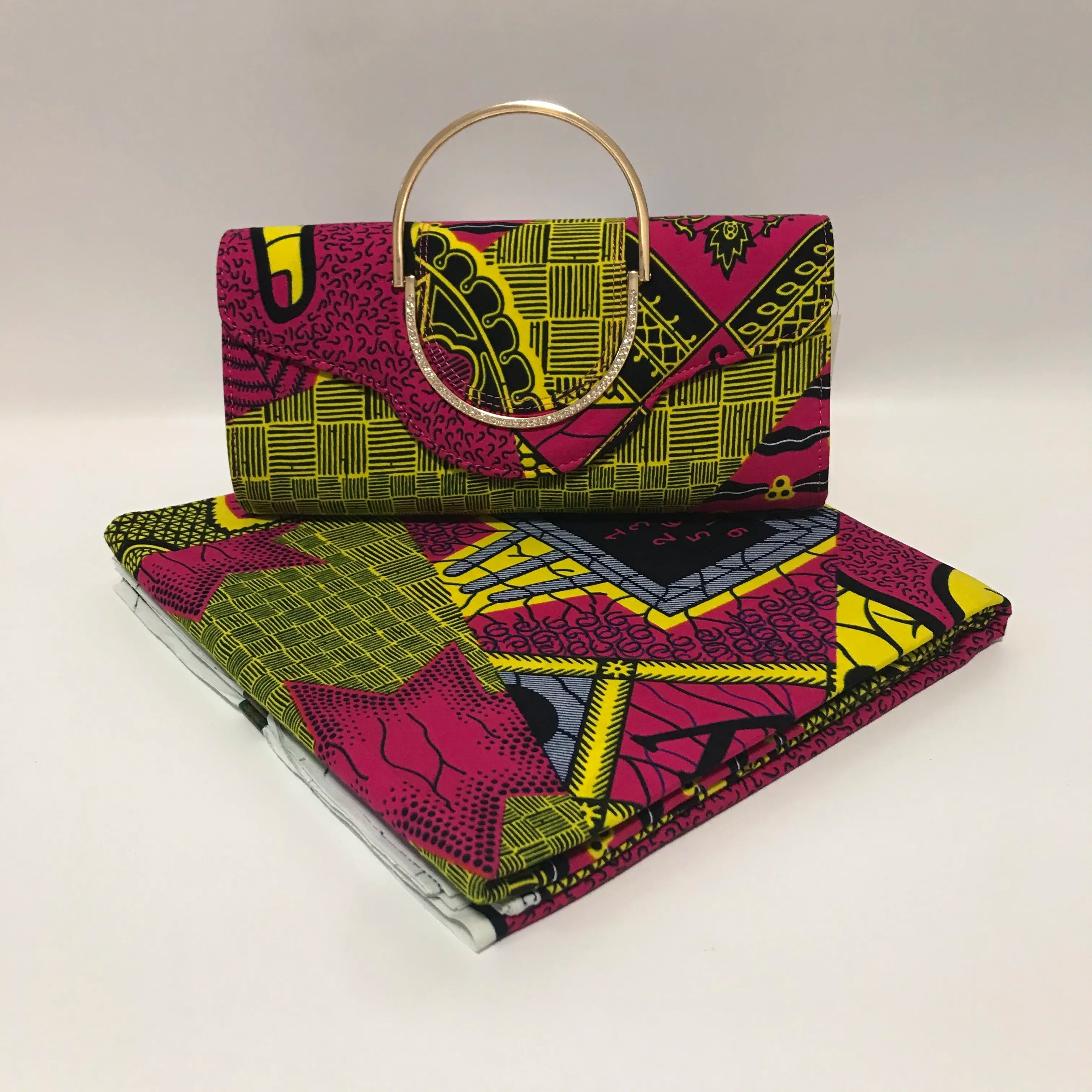 Wax Print Fabric Ensemble: Elevate Your Style with a Matching Ankara Bag for Sewing Stylish Dresses - Flexi Africa - Flexi Africa offers Free Delivery Worldwide - Vibrant African traditional clothing showcasing bold prints and intricate designs