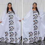 Step into timeless African luxury with our Bazin Riche Embroidery Couple Design Dress — a floor-length masterpiece