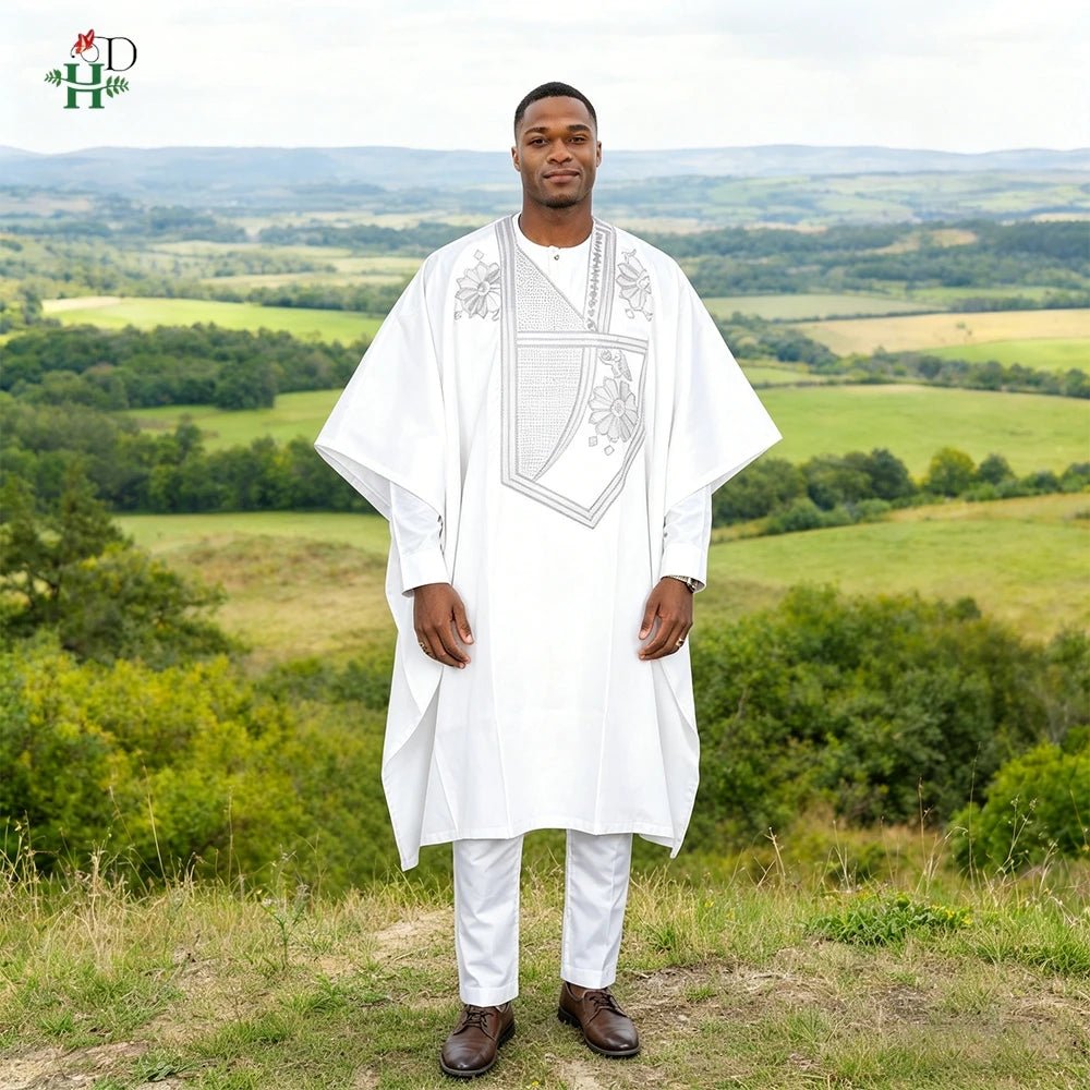 Step into timeless elegance with this African Men’s White 3PC Bazin Riche Outfit, a refined traditional clothing set designed