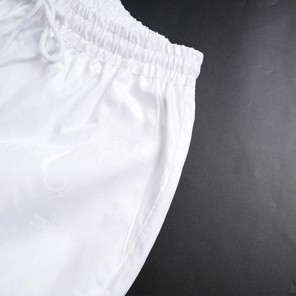 Step into timeless elegance with this African Men’s White 3PC Bazin Riche Outfit, a refined traditional clothing set designed