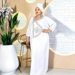 Step into timeless elegance with this African Men’s White 3PC Bazin Riche Outfit, a refined traditional clothing set designed