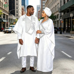 Step into timeless elegance with this African Men’s White 3PC Bazin Riche Outfit, a refined traditional clothing set designed