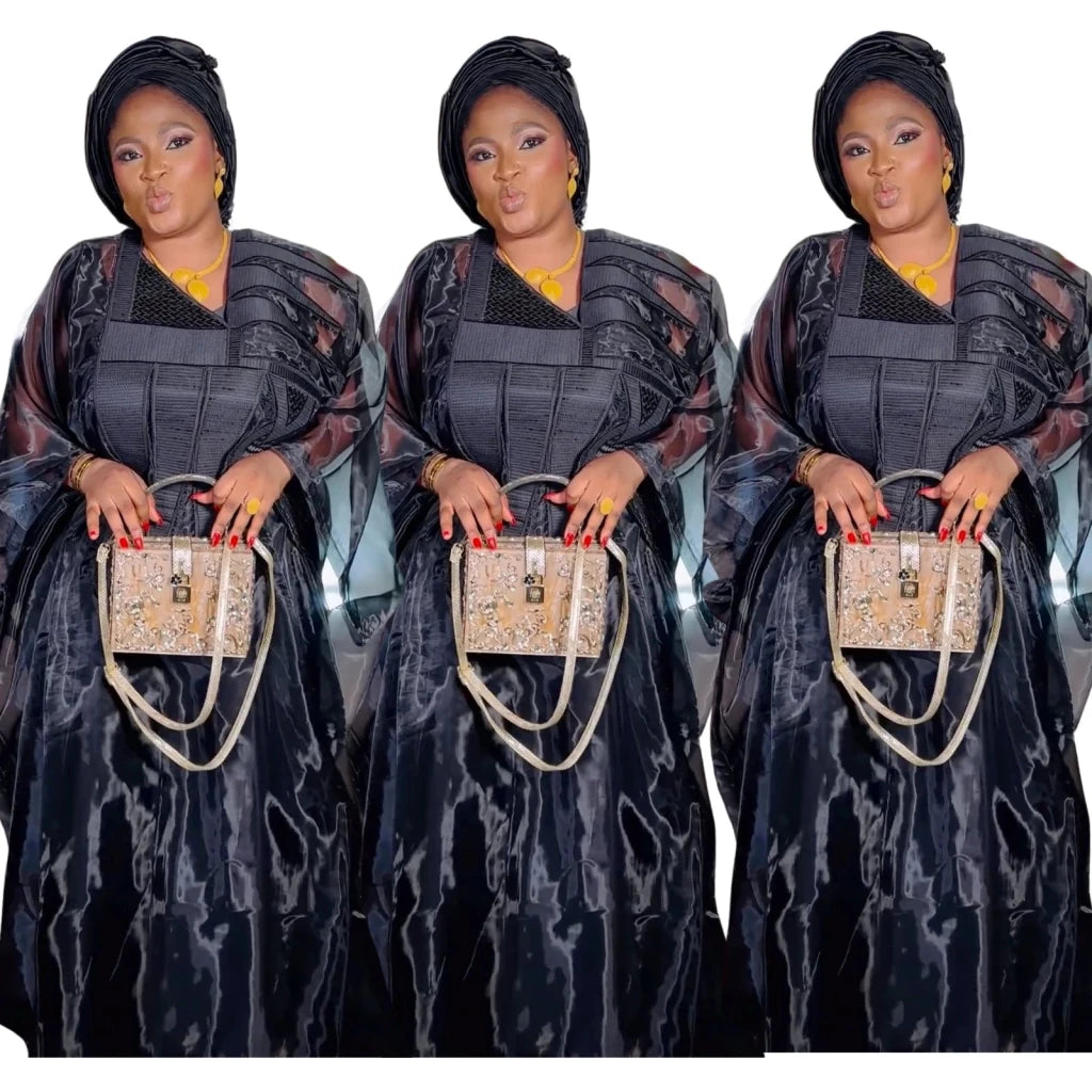 Experience timeless elegance and modesty with this stunning Black African Embroidered Abaya Dress, beautifully for women