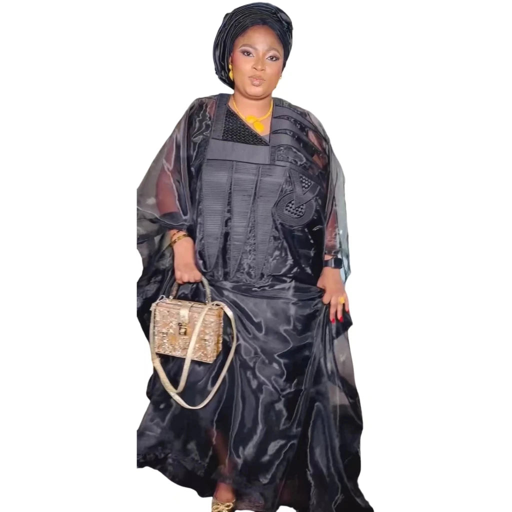 Experience timeless elegance and modesty with this stunning Black African Embroidered Abaya Dress, beautifully for women
