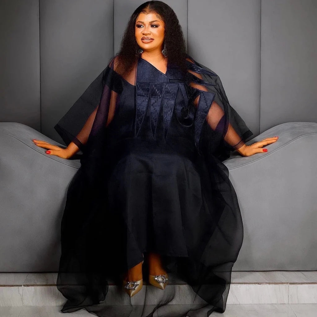 Experience timeless elegance and modesty with this stunning Black African Embroidered Abaya Dress, beautifully for women