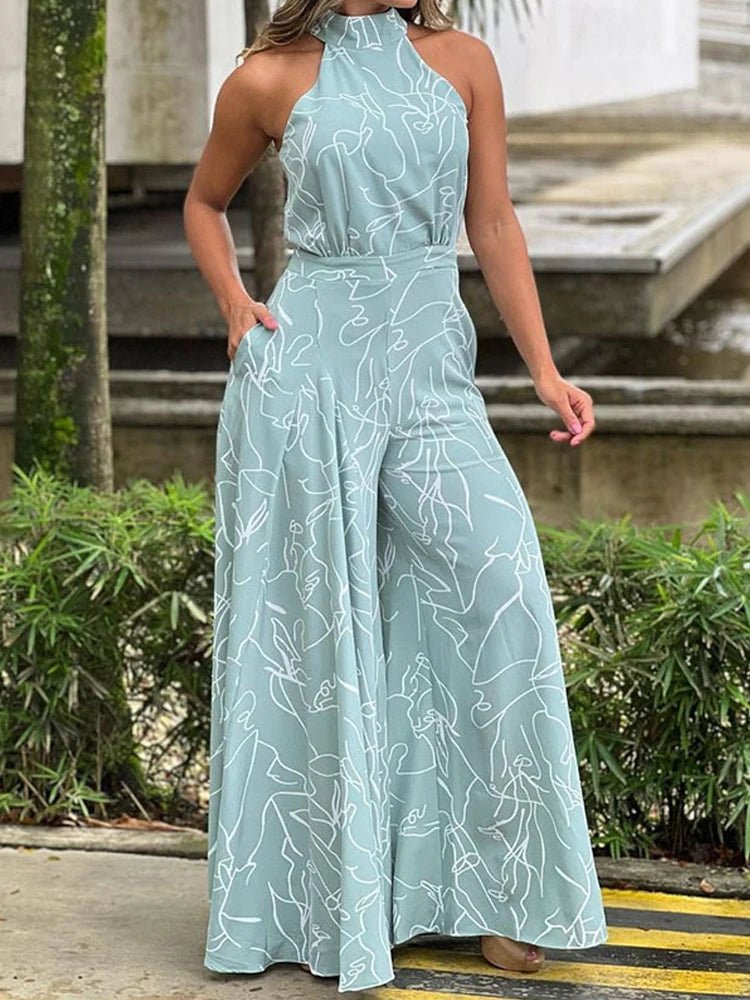 Elegant Halter Neck Jumpsuit: Casual Printed Design with Sleeveless Tie, Wide Leg Pants - Flexi Africa - Free Delivery Worldwide only at www.flexiafrica.com