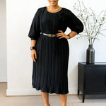 Elevate your wardrobe with this elegant African-inspired A-Line Midi Dress, designed to combine timeless sophistication