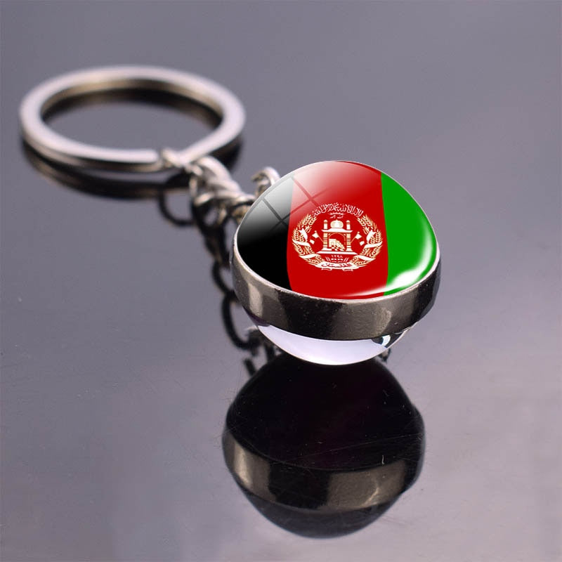 Exquisite Glass Ball Keychains Featuring Designs Inspired by North African Nations - Flexi Africa - Flexi Africa offers Free Delivery Worldwide - Vibrant African traditional clothing showcasing bold prints and intricate designs